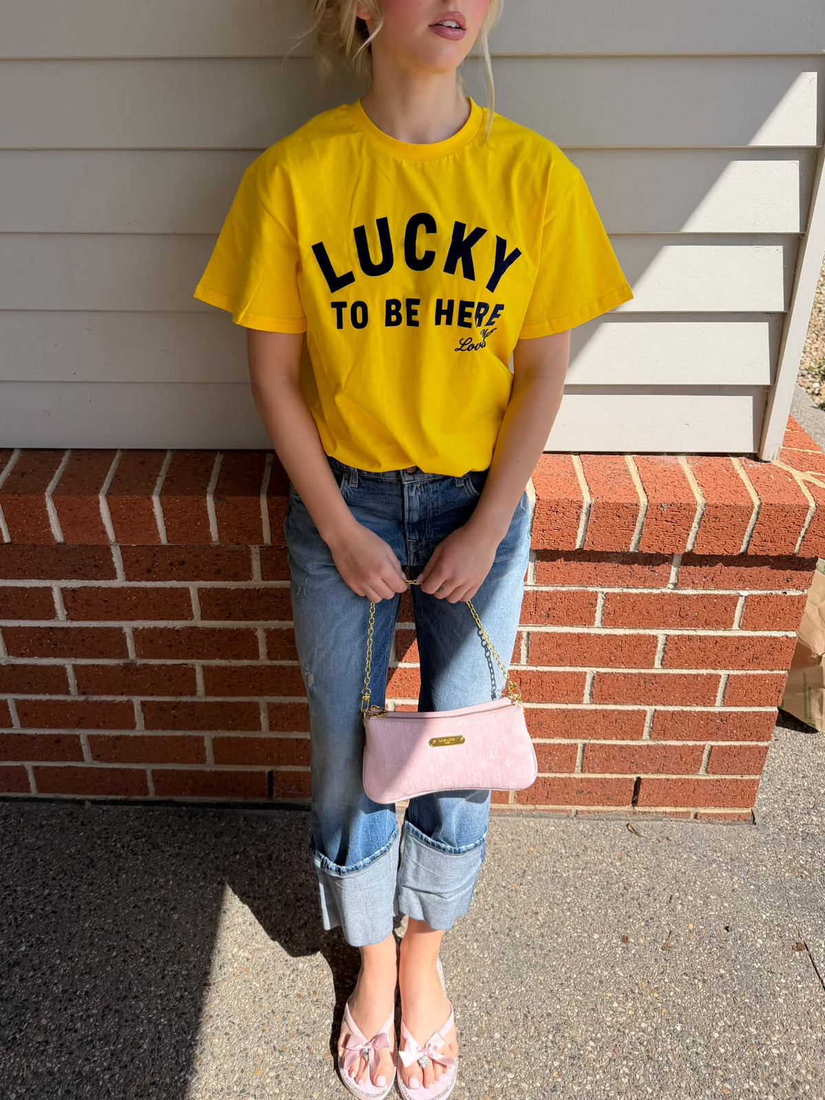 LUCKY TO BE HERE TEE LOVA